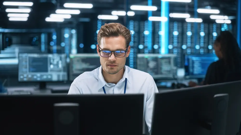 IT professional at desk
